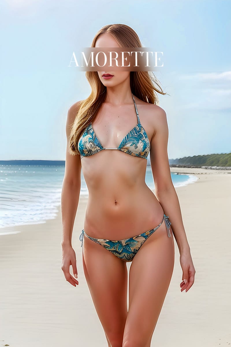 amorette international - angelina - elegant lady in a blue binikini on the beach